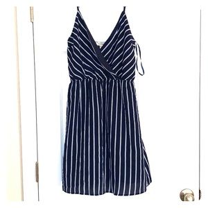 A blue dress with white stripes